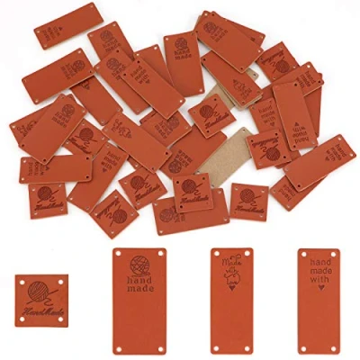Image of SAVITA 40PCS Handmade Leather Labels PU Hand Made Embossed Tags with Holes for Crafts, Knitting, and Crocheting(4 Patterns)