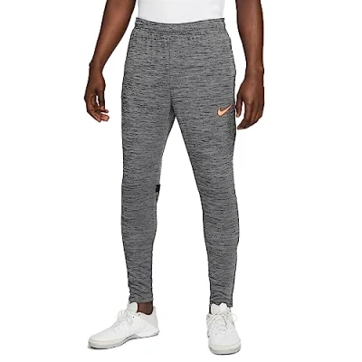 Image of NIKE Men&#039;s Dri Fit Academy Trk Kp Fp Ht Pants, Black/Sunset Glow, XL UK
