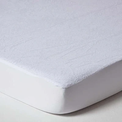 Image of HOMESCAPES Pack of 2 Cot Size Terry Towelling Waterproof Mattress Protector 60 x 120 cm 100% Cotton Pile Top Breathable Hypoallergenic Washable with Elasticated Stretch Fabric Skirt