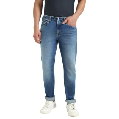 Image of Calvin Klein Jeans Taper Slim fit jeans, Men&#039;s, Size: 32x34, Denim medium