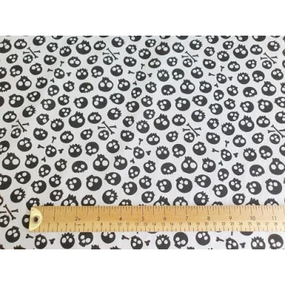 Image of Oddies Textile Halloween Polycotton Fabric Small Skull &amp; Crossbones Craft Material Metre White with Black Skulls (C7769)