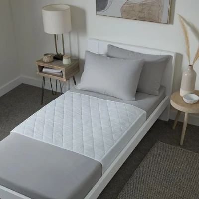 Image of Waterproof bed pad with tucks Washable wetting sheet for adults or children incontinence Reusable mat Discreet white