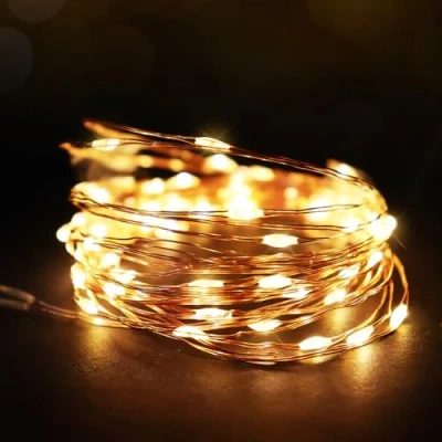 Image of ANSIO Fairy Lights Battery Operated 100 LED Copper Wire Indoor Outdoor Christmas Lights, Bedroom String 10m/33ft, Ideal for Tree, Party &amp; Wedding DecorationsWarm White