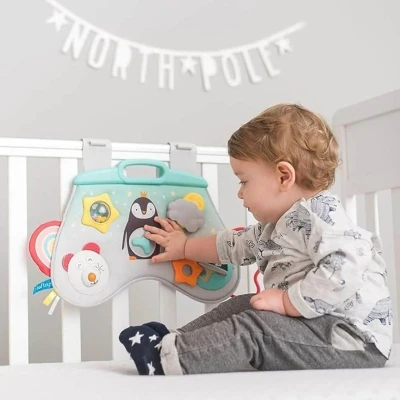 Image of Taf Toys Laptoy Centre Baby Activity Toy. 12 Sensory Activities including Music, Lights, Rattle &amp; Crinkling textures. Easily attaches to Cot or Crib. Portable. Suitable for Boys Girls age 6 months +