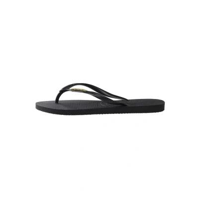 Image of Havaianas Women&#039;s Slim Logo Flip Flops, Black (Black/Gold), 8 UK