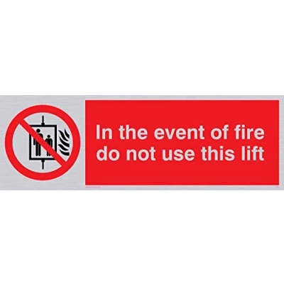 Image of Viking Signs PV53 L31 SV &quot;In The Event Of Fire Do Not Use This Lift&quot; Sign, Silver Vinyl, 100 mm H x 300 W