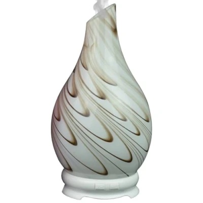 Image of Cello Glass Ultrasonic diffuser in our Galaxy Swirl oil design. An aromatherapy to pair with essential oils for a stunning release of home fragrance through scented diffusers.