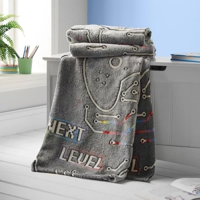 Image of Catherine Lansfield Game Over Glow in the Dark Fleece Cosy 130x170 cm Blanket Throw Black