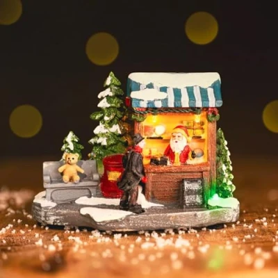 Image of HomeZone Marco Paul Christmas Village Scene With Music Animated LED Ornament Battery Powered (christmas tree stall) Festive