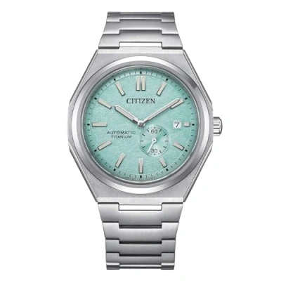 Image of Citizen automatic Super Titanium men&#039;s watch with turquoise background NJ0180 80M
