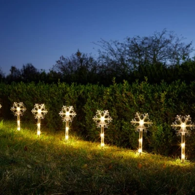 Image of Battery Operated Set of 8 Light up Christmas Snowflake Garden Stakes with LEDs