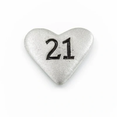 Image of Metal Planet Ltd 21 a single pewter mini heart token