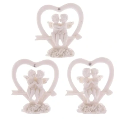 Image of Puckator Lovers Glitter Cherubs Sitting in Cupids Arrow Heart, resin, Mixed, Height 5.5m Width 5.5cm