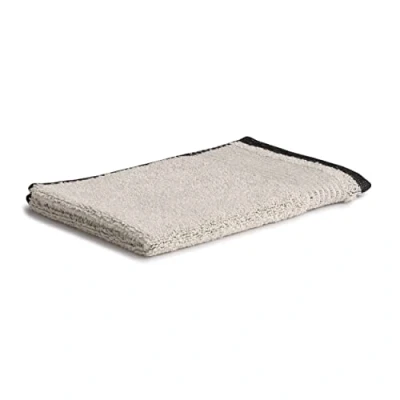 Image of möve Eden guest towel piped border 30 x 50 cm made of 80% cotton / 20% linen, nature black