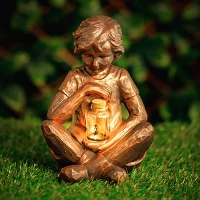 Image of Garden Mile Novelty Resin Solar Powered Ornament Weatherproof Durable Patio Decoration Boy with Light Up Firefly Jar for Garden, Flowerbed, Pathway, and