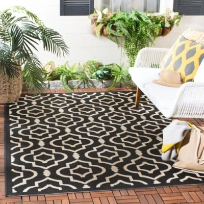 Image of SAFAVIEH Trellis Rug for Indoor &amp; Outdoor Courtyard Collection, Short Pile, in Black and Beige color, 160 X 231 cm