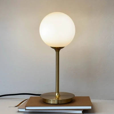 Image of Dyberg Larsen table lamp Sia, opal/brass coloured, height 12 cm
