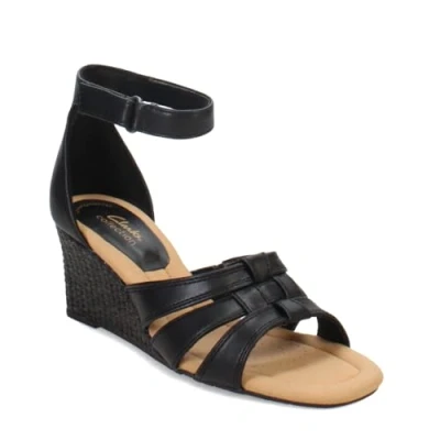 Image of Clarks Women&#039;s Kyarra Joy Wedge Sandal, Black Leather, 7 UK