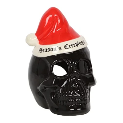 Image of Gothic &quot;Season&#039;s Creepings&quot; Skull Tealight Holder 16cm x 10cm (1 Pc.) Alternative Festive Decor with Black and Santa Hat, Perfect for a Spooky Christmas Ambiance