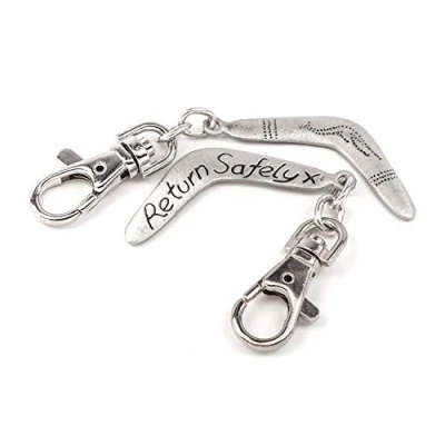 Image of Boomerang Travel Clip on Pewter Bag Charm with a Return Safely Message
