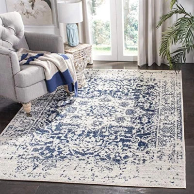 Image of SAFAVIEH Modern Chic Rug for Living Room, Dining Bedroom Madison Collection, Short Pile, in Cream and Navy, 155 X 229 cm