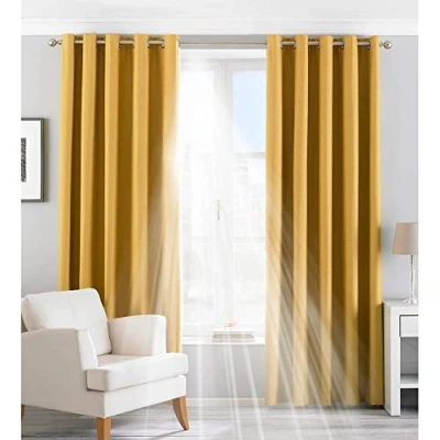 Image of Riva Home Twilight Blackout Eyelet Curtains in Ochre Yellow Size 117 cm x 137