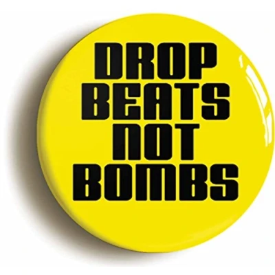 Image of Ozorath DROP BEATS NOT BOMBS PEACE BADGE BUTTON PIN (Size is 1inch/25mm diameter)