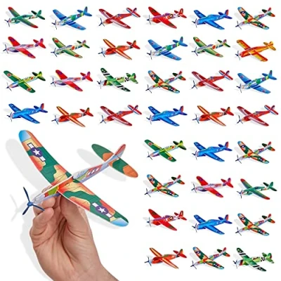 Image of THE TWIDDLERS 48 Flying Glider Planes for Kids Easy to Assemble, Individually Wrapped Goody Bag Favour Toys, Jet Fighters Gliders Party Fillers, Foam Aeroplanes