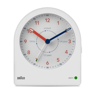 Image of Braun Analogue Time Teacher Alarm Clock with Snooze and Continuous Backlight, Quiet Quartz Movement, Easy to Read Dial, Crescendo Beep in White, model BC22TW.