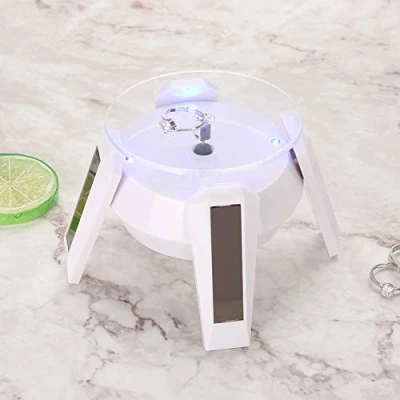 Image of Solar Rotating Display Stand, 360 Turntable with LED Light for Watch Phone Jewelry (White)