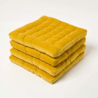 Image of HOMESCAPES Set of 4 Mustard Yellow Velvet Seat Pads for Dining Chair 40 x cm Super Soft 100% Cotton Quilted with Straps Indoor &amp; Outdoor Garden Use Lasting Comfort Support