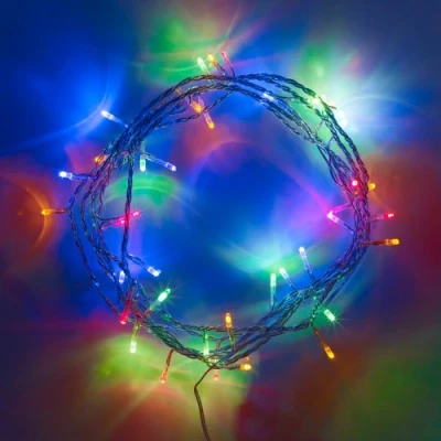 Image of Lights4fun Indoor Fairy Lights with 50 Mulitcoloured LEDs on 4m of Clear Cable Plug in Rocker Switch