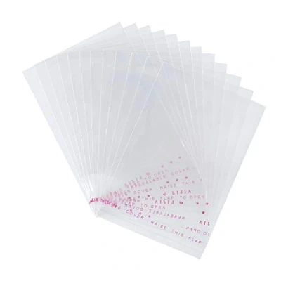 Image of NBEADS 1000 Pcs Clear OPP Cellophane Bags, Plastic Bags Self Adhesive Sealing Treat Cello for Candy Cookies, 10x7cm