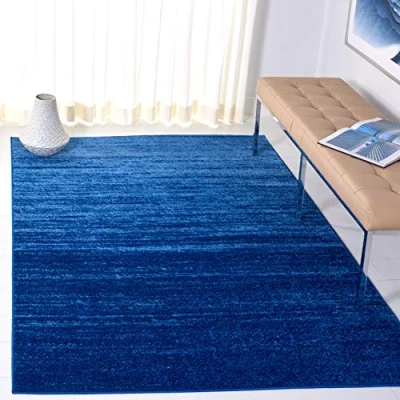 Image of SAFAVIEH Modern Ombre Rug for Living Room, Dining Bedroom Adirondack Collection, Short Pile, in Light Blue and Dark Blue, 155 X 229 cm