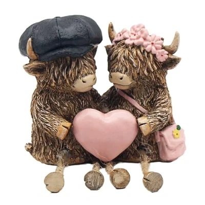 Image of Lesser &amp; Pavey Highland Cow Bronze Effect Ornament with Cute Dangle Legs and Accessories Tartan, Blue, Green Red or Pink Hat, Scarf Bag House Decoration Gift (Pink)