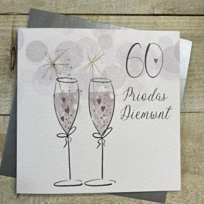 Image of White Cotton Cards 60 PRIODAS DIEMWNT (DIAMOND WEDDING ANNIVERSARY) FLUTES WITH SPARKLER WELSH ANNIVERSARY CARD, HANDFINISHED (W DA60)