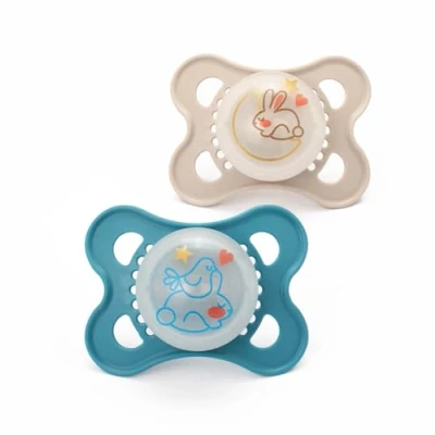 Image of MAM Original Pure Night Soother 2 6 Months (Set of 2), Sustainable and Bio Renewable Baby Soother, SkinSoft Silicone Teat, Glow in the Dark Blue/Cream (Designs May Vary)