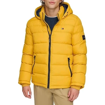 Image of Tommy Hilfiger Men&#039;s Legacy Hooded Puffer Jacket Down Alternative Coat, Yellow, S