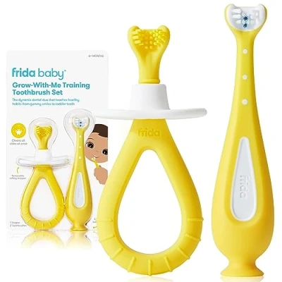 Image of Frida Baby Training Toothbrush Grow with Me Set, 1 + Toddler for use from 6 24 Months, Easy Grip Handle, Triple Angle Silicone Bristles, Soft Bristles