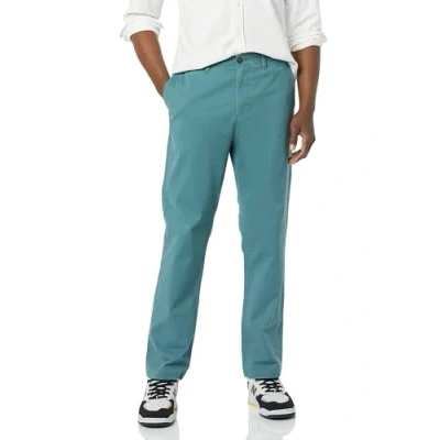 Image of Amazon Essentials Men&#039;s Athletic Fit Casual Stretch Chino Trouser (Available in Big and Tall), Dark Green, 31W / 29L