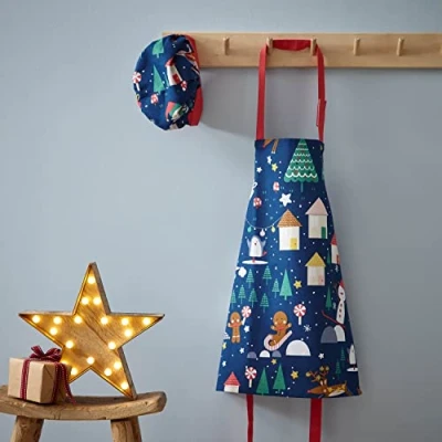 Image of Catherine Lansfield Dining Santa&#039;s Christmas Wonderland Kids Apron 48x55 cm &amp; Hat Set 20x24 Navy