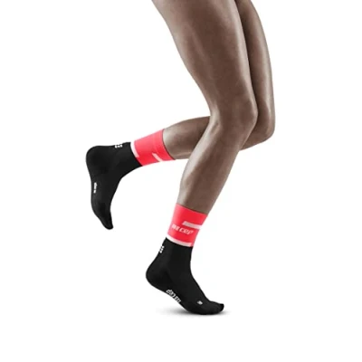 Image of CEP THE RUN compression socks MID CUT for women Medium length running in pink/black with Regenerating Size II S
