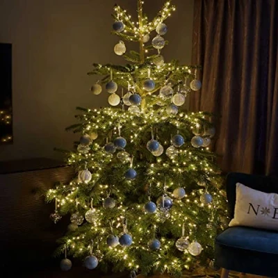 Image of Qbis 800 LED Christmas Lights, Warm White Lights on Green Wire. 1 in 10 Random Twinkling Fairy Lights. Tree Indoor or Outdoor use (Warm (800 Wire))