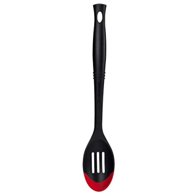 Image of Le Creuset of America Revolution Bi Material Slottted Spoon, Cerise (Cherry Red)