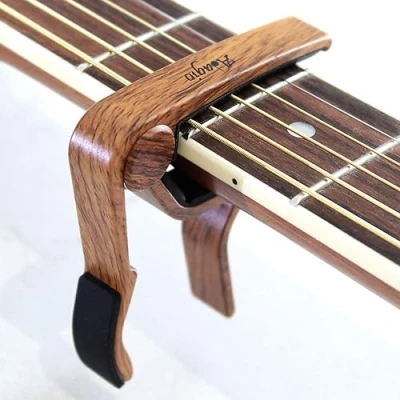 Image of ADAGIO PRO Acoustic and Electric Guitar Capo With 5x Free Picks. The perfect quick release accessory capotasto clamp! Also suitable for ukulele banjo strings (Rosewood)