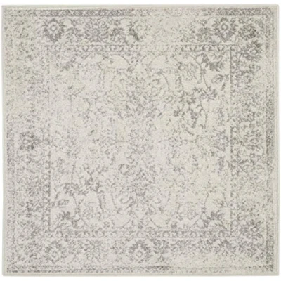 Image of SAFAVIEH Adirondack Collection Area Rug 4&#039; Round, Ivory &amp; Silver, Oriental Distressed Design, Non Shedding Easy Care, Ideal for High Traffic Areas in Living Room, Bedroom (ADR109C), 1.0&quot; Thickness
