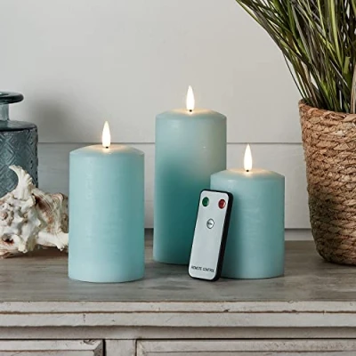 Image of Lights4fun Set of 3 Distressed Wax TruGlow® Battery LED Flameless Pillar Candles Real Light Blue with Remote Control