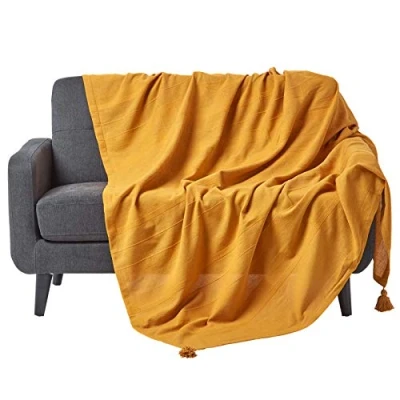 Image of HOMESCAPES Rajput Ribbed Throw 90 x 100 Inches Mustard Yellow Handmade 100% Cotton Suitable for 2 Seater Sofas Double Bedspreads Easy care washable at home
