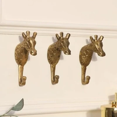 Image of Melody Maison Set of 3 Gold Metal Giraffe Wall Hooks