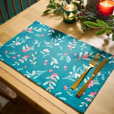 Image of Catherine Lansfield Christmas Holly and Mistletoe Cotton 30x46 cm Dining Placemat 4 Pack Green